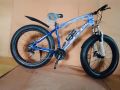 Fat Tyre Bike by PLUS - Adventure Redefined, 21 Speed, Shimano Gears, Front shock double disk 10 gears, 26 Inches, Aluminum Frame. 