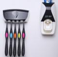 Automatic Toothpaste Dispenser With Tooth Brush Holder. 