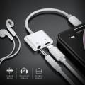 Apple iPhone Headphone Jack Adapter 2 in 1 Jack Adapter Lightning to Charging Port and 3.5mm Headphone Jack - White. 