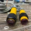 E3F-5DN1 series cylinder amplifier photoelectric sensor. 