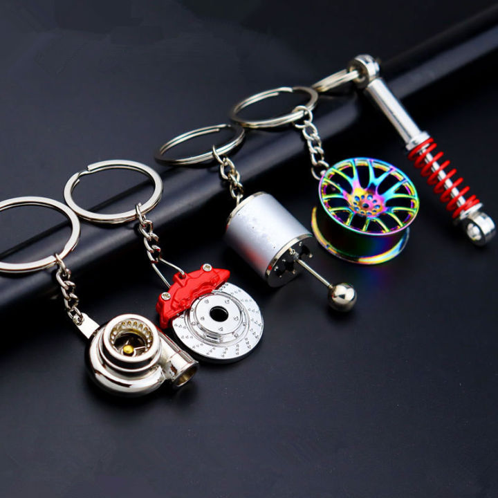 Creative gift car metal keychain turbo gear hub pendant brake disc shock absorber Pendant. Metal Gear Box keychain and Disk Brake Metal Keychain Style Car Key Chain Gear Shift Knob Key Ring Gift / Stylish Metal Gear Box Design Car Key Chain