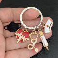 New Doctor Keychain Medical Tool Key Chain Heartbeat Stethoscope Syringe Nurse Cap Key Ring Nurse Gift DIY Handmade Jewelry. 