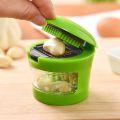 Garlic Press, Chopper, and Storage Container, Includes Silicone Garlic Peeler, Easy to Clean, Stainless Steel Blades, Green. 