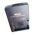 NIKON BATTERY CHARGER MODEL MH-24 FOR CHARGING BATTERIES. 