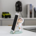 Cell Stand Hands-free Active Poses Astronaut Phone Holder. 