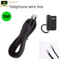 Black telephone cord, telephone cord, telephone extension cord, and cable wire.. 