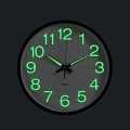 Night Glow Wall Clock in Dark Night. 