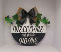 Elegant MDF Wooden Welcome Sign | 12-Inch Round Hanging Decor for Front Door/Wall | Handcrafted with Floral Bunch & "Welcome to Home" Handwritten Text. 