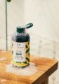 The Body Shop Banana Truly Nourishing Shampoo (250ML). 