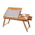 Multipurpose foldable adjustable laptop table stand for bed and sofa with USB cooling fan and drawer. 
