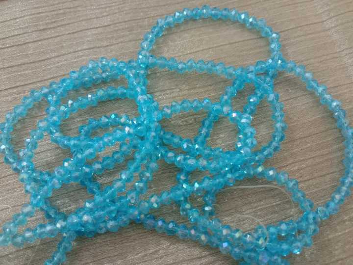 Six%20(06)%20Larri%20of%204%20mm%20Crystal%20Beads%20%7C%20Pearls%20%7C%20Moti%20Pack%20%7C%20Moti%20Larri%20%7C%20White,%20Light%20Blue,%20Yellow,%20Black,%20Bottle%20Green%20&%20Orange%20Color%20-%20Image%203