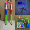 Hand push bazooka luminous rocket launcher luminous sound can fire cupola toys in Park Square. 
