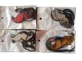 "Majestic Adornments: Moustache White, Red & Gold Lockets Chains for Bikes". 