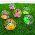 Transparent Rubber Ball Toy / Toy Ball with Flashing Light and Toy Inside. 
