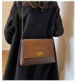 Elegant Black Suede and Leather Shoulder Bag for Women – Gold Chain Strap, Vintage Clasp Closure, Luxe Texture, Spacious Design – Perfect for Office, Travel, Brunch, or Evening Occasions.. 