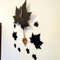 Clock Black Maple Leaf Wall Clock with Pendulum. 