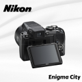 Nikon Coolpix P90 Digital Camera with 24x Wide Angle Optical Vibration Reduction (VR) Zoom and 3 inch Tilt LCD. 