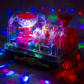 Transparent Electric Gear Train with Music Light Rotating Toy for Kids. 