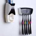 Toothpaste Dispenser With Tooth Brush Holder. 