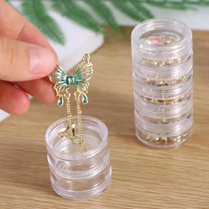 Mini%20Round%20Jewelry%20Storage%20Box%20(5%20Layer)%20%E2%80%93%20Transparent%20Acrylic%20Organizer%20for%20Rings,%20Earrings,%20Studs%20&%20Small%20Accessories%20%7C%20Compact%20360%C2%B0%20Rotating%20Jewelry%20Case%20for%20Dressing%20Table%20&%20Travel%20-%20Image%204