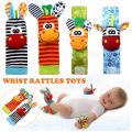 4 Pcs Baby Rattle Animal Socks Wrist Strap + Baby Socks Foot Finder Educational Hand bells Cute Giraffe Cartoon Baby Toy. 