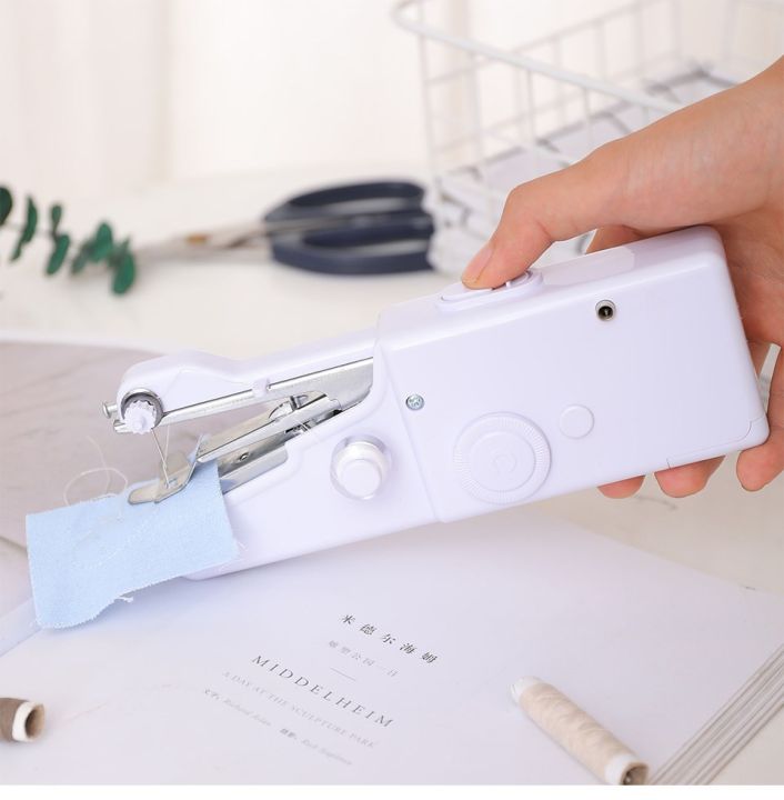 New Hand Mini Sewing Machine Quick Handy Stitch Sew Needlework Cordless Clothes Fabrics Portable Household Electric Sewing Machine