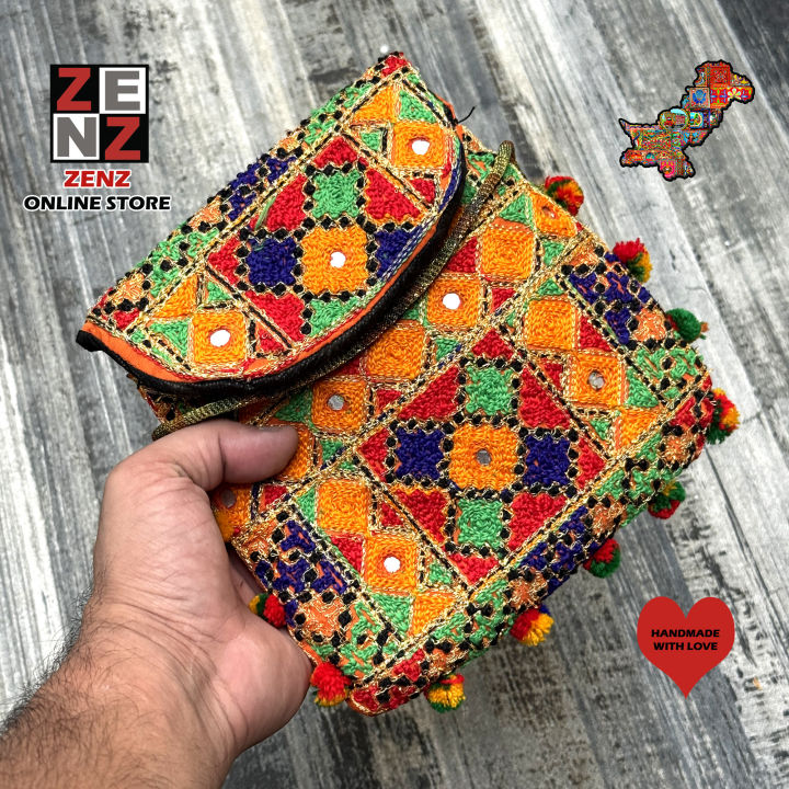 Multicolour Purse Hand Bag crafted with Embroidery & Sequins by ZENZ Sindhi Traditional Wear Embroidered Pouch