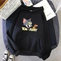 Black Tom And Jerry Fleece Full Sleeves Pull Over Hoodie For Women - Stay Cozy With Tom And Jerry - High Quality Fabric. 