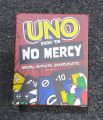UNO Show 'Em No Mercy Cards Game with tougher rules and penalties. 