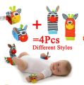 4 Pcs Baby Rattle Animal Socks Wrist Strap + Baby Socks Foot Finder Educational Hand bells Cute Giraffe Cartoon Baby Toy. 