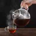 Premium Glass Tea Kettle - Borosilicate Glass with Stainless Steel Strainer, Heat Resistant Teapot, Microwave and Stove Safe Tea pot - 950ml - 1300ml. 