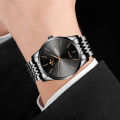 FOURRON Men's Waterproof Calendar Ultra-thin Stainless Steel Strap Quartz Watch. 
