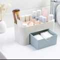 Cosmetics storage box, table organizer, vanity box with makeup, and dressing table stand. 