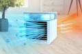 Arctic Air Cooler Portable Mini Air Cooler Mobile Air Conditioner Arctic Air Air Conditioner Evaporative Cooler Portable Air Conditioner with Water Cooling Humidifier and Air Purifier Portable table. 