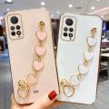 For Xiaomi Redmi Note 11 Back Cover with Love Heart Wristband Chain Fashion Shiny Bracelet Square Bumper Camera Lens Protection Soft Silicone Protective Case. 