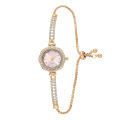 New 2024 Fashion Diamond-Embedded Plum Blossom-Shaped Women's Hand Bracelet Watch Women's Quartz Watch. 