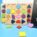 Colorful Geometric Shapes Learning Board For Montessori Kids. 