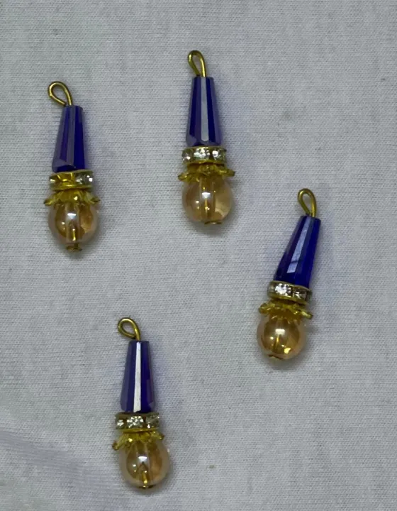 Beautiful%20Hanging%20Beads%20for%20Necklines%20%E2%80%93%204%20Pcs%20Pack,%20Premium%20Decorative%20Tassels%20for%20Kameez,%20Trouser%20&%20Dupatta,%20Export%20Quality%20Limited%20Edition%20Embellishment%20Accessories,%20Vibrant%20Stylish%20Add-Ons%20at%20Just%20Rs.%20149%20-%20Image%204