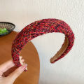 Autumn and winter high-end sense New Year's red headbands women's wide-brimmed pressed hair non-slip headbands Internet celebrity retro hairpins hair bundle headgear. 
