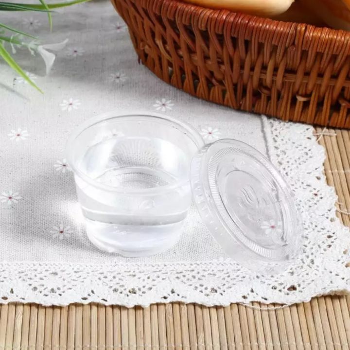 Pack%20of%2050%20Disposable%20Small%20Plastic%20Sauce%20Cups%20with%20Lids%20-%20BPA-Free,%20Leakproof,%20Reusable,%20Portable%20Food%20Storage%20Containers%20-%20Image%209