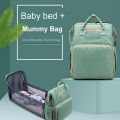 2in1 Multifunctional Travel Mommy Backpack Portable Crib Nappy Bag Large Capacity Diaper Bags  Baby Bed Crib Bag Random Color. 