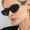 European and American triangle cat eye sunglasses men and women sunglasses trendy sunglasses star Bengdi. 