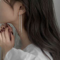 Japanese and Korean fashion temperament tassel women's slim tassel earrings simple high-end design sparkling diamond silver drop earrings. 