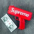 Money Gun_ Make Cash Money Rain Bill Plastic Gun_ Box Shot Spread the Money Toy. 
