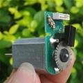 Small 12V DC motor with optical encoder. 