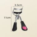 Eyelash curler. 