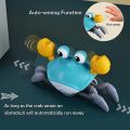 Hot Selling sensing crab walking crawling crab baby toys with music and led Baby Funny toy crawling crab. 