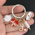 New Doctor Keychain Medical Tool Key Chain Heartbeat Stethoscope Syringe Nurse Cap Key Ring Nurse Gift DIY Handmade Jewelry. 