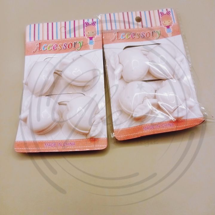 A Pair of Korean Style White Apple Shape Hair Ponies - Adorable Hair Accessories for a Fun Twist