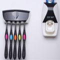 Creative wall-mounted toothbrush holder automatic toothpaste squeezer set bathroom toilet toothbrush storage stand without punching. 